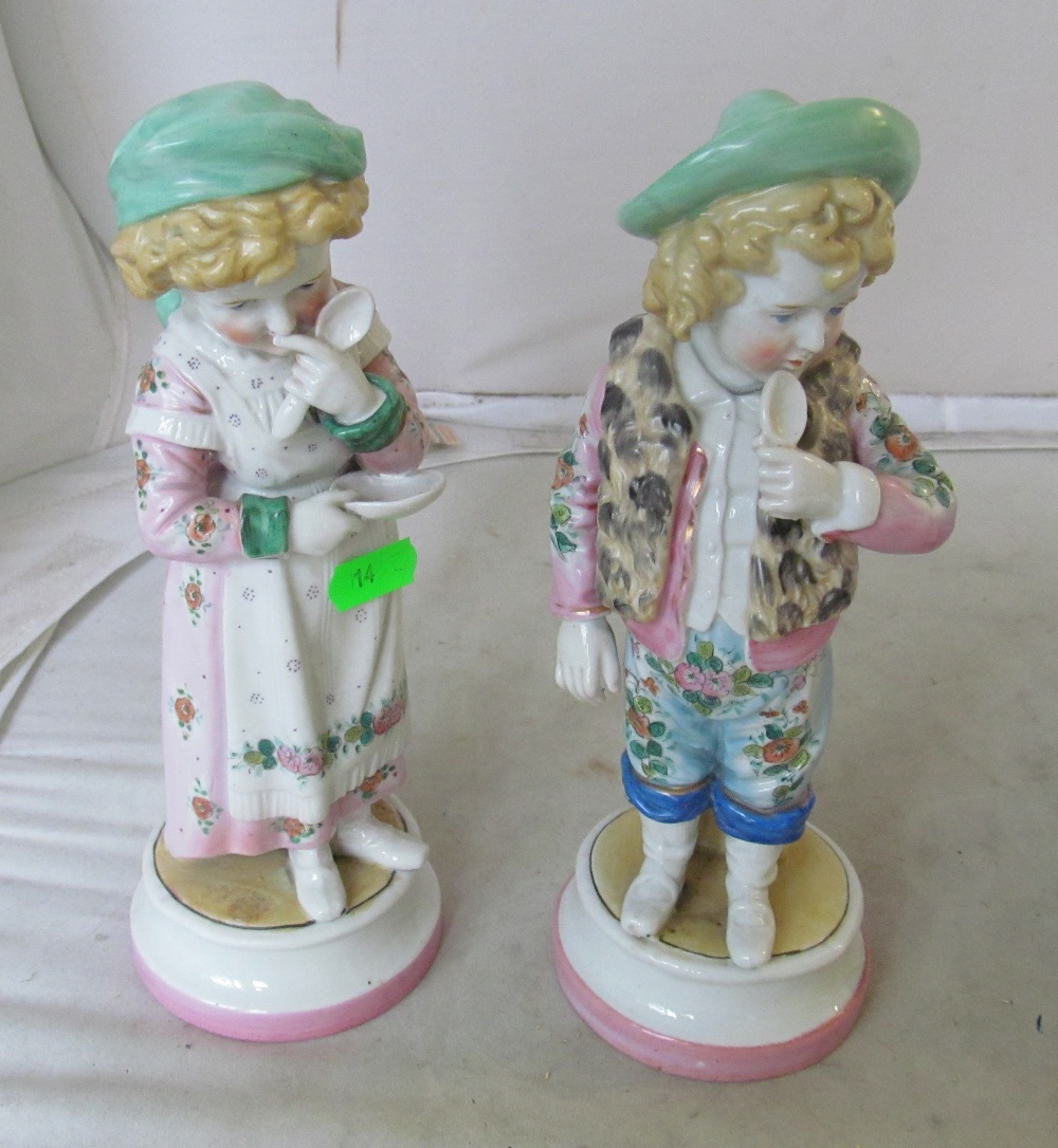 A pair of Victorian figures boy and girl holding spoons, three small crinoline ladies, two snow - Image 3 of 3