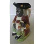 A 19th Century Pratt style 'Black man' toby jug (restored and missing hat lid)