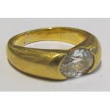 An oval cut diamond ring in gold coloured setting 8.5g, size J/K