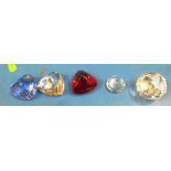 A Swarovski paperweight, prism, three hearts and a small oyster shell