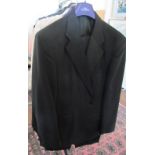 A gents black mourning suit and a dinner jacket and trousers