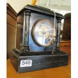 A black slate mantel clock