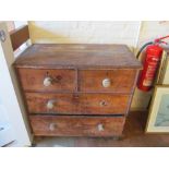 A pine chest of two short and two long drawers