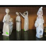 Three Lladro figures children with candles (one a/f) and another boy yawning