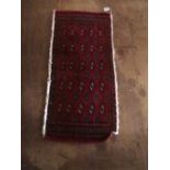 A small Iranian red rug
