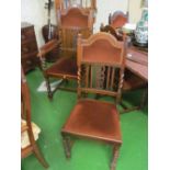 A set of 6 oak dining chairs 1 carver and 5 standard with heart design