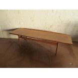 A 1970's Danish teak surfboard coffee table