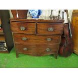 A mahogany bow front chest of two short and two long drawers