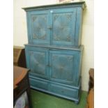 A painted turquoise antique Sri Lankan cabinet with four 'sunburst' carved doors on later stand with