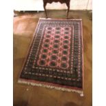 A Bokhara pink ground rug