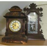 An Ansonia Clock Co mantel clock with floral decorated glass door and another mantel clock