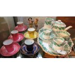 A Tete a Tete teaset, other cups and saucers and two figures