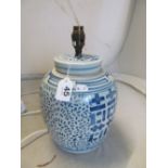 A Chinese rice pattern blue and white table lamp