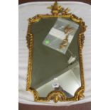 A 19th Century gilt framed mirror with cresting of two birds and leaves