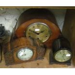 A walnut cased Art Deco mantel clock and two small oak cased clocks
