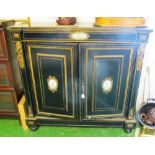 An ebonised Pier cabinet with Sevres panels