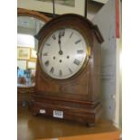 An oak and mahogany cased clock (no glass)