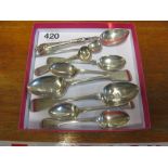 A box of silver spoons