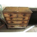 A pine chest of two short and three long drawers