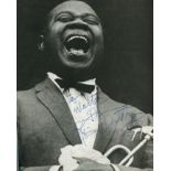 ARMSTRONG LOUIS: (1901-1971) American jazz trumpeter.