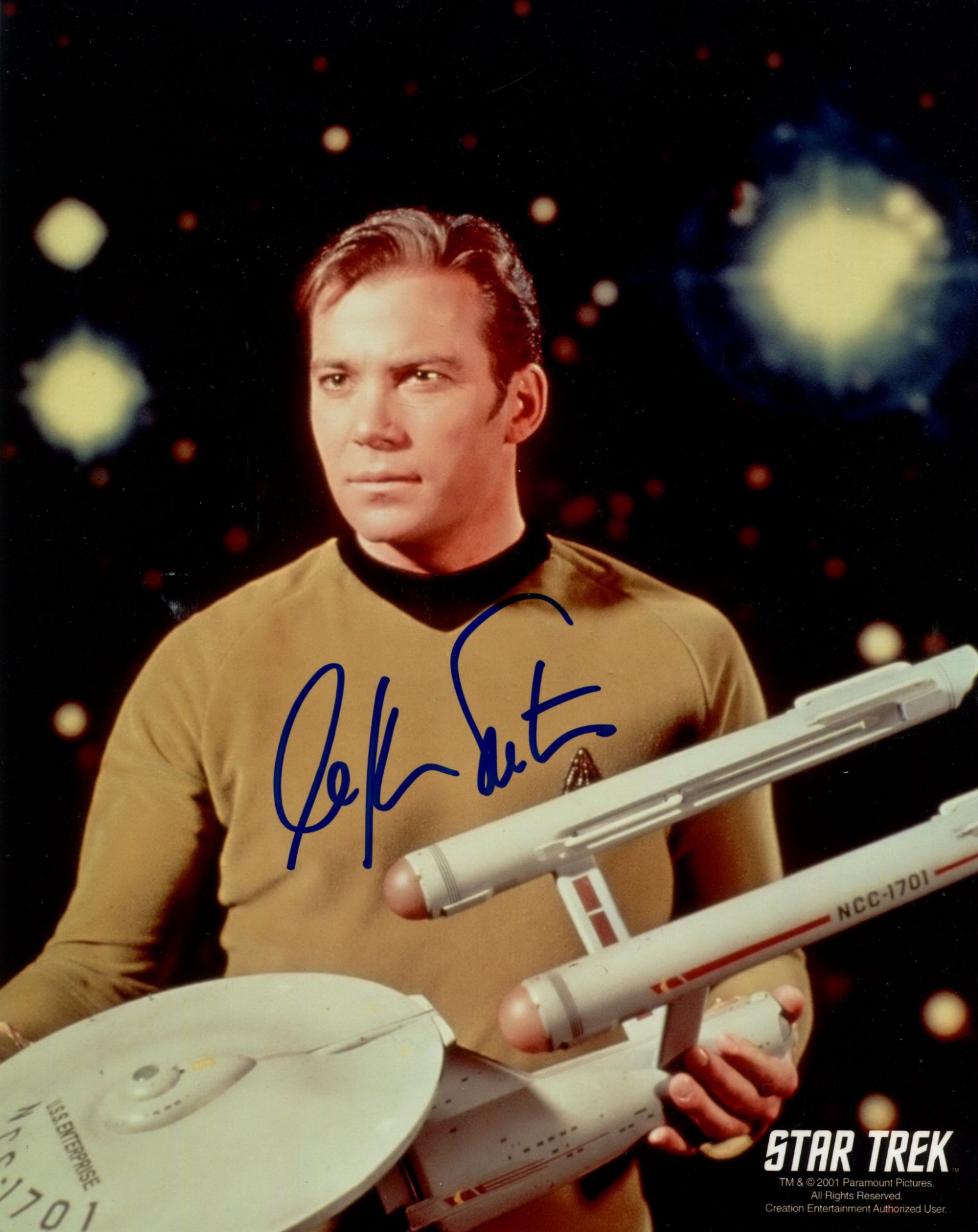 STAR TREK: A good selection of five signed colour 8 x 10 photographs by various leading cast