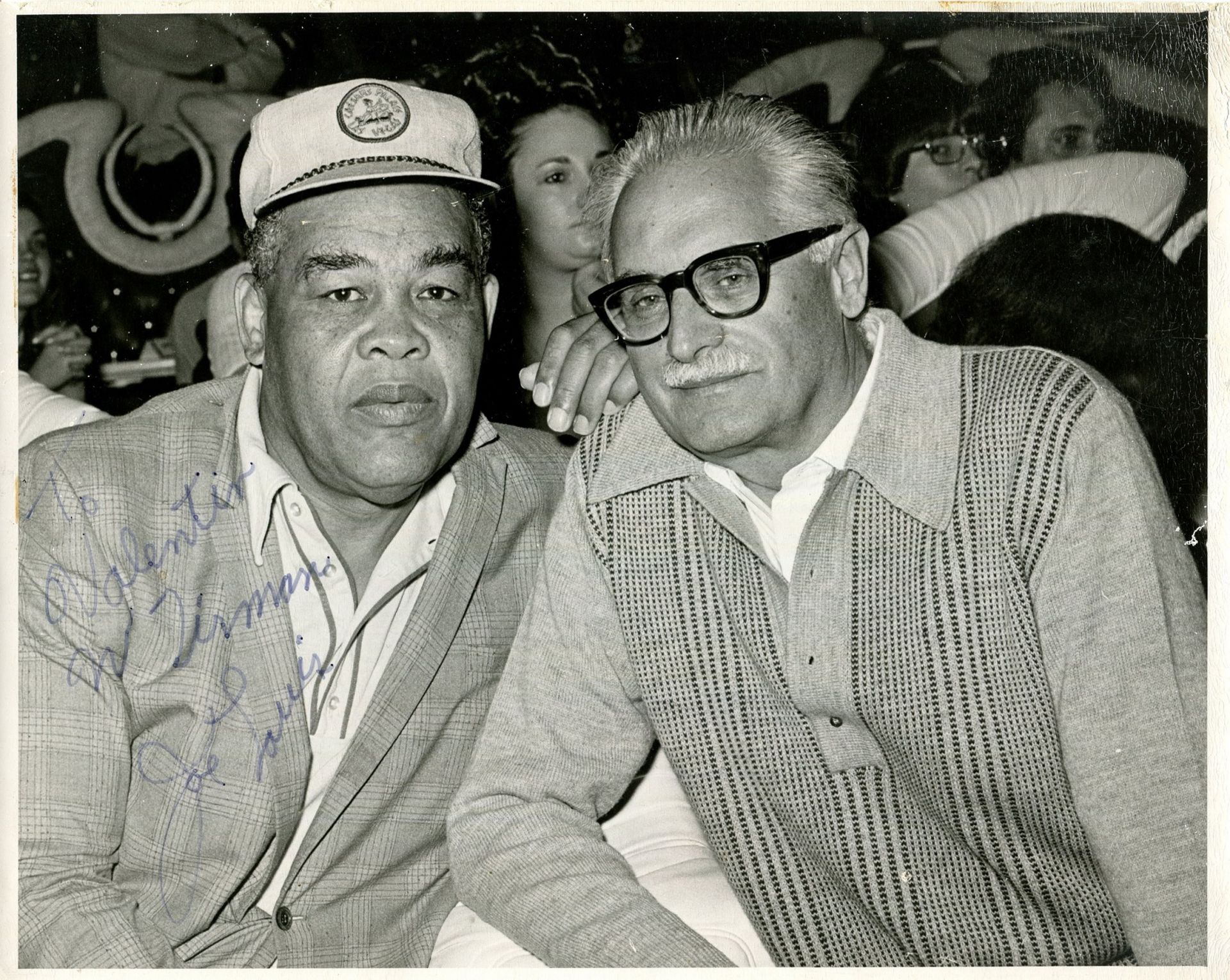 LOUIS JOE: (1914-1981) American boxer, World Heavyweight champion 1937-49.