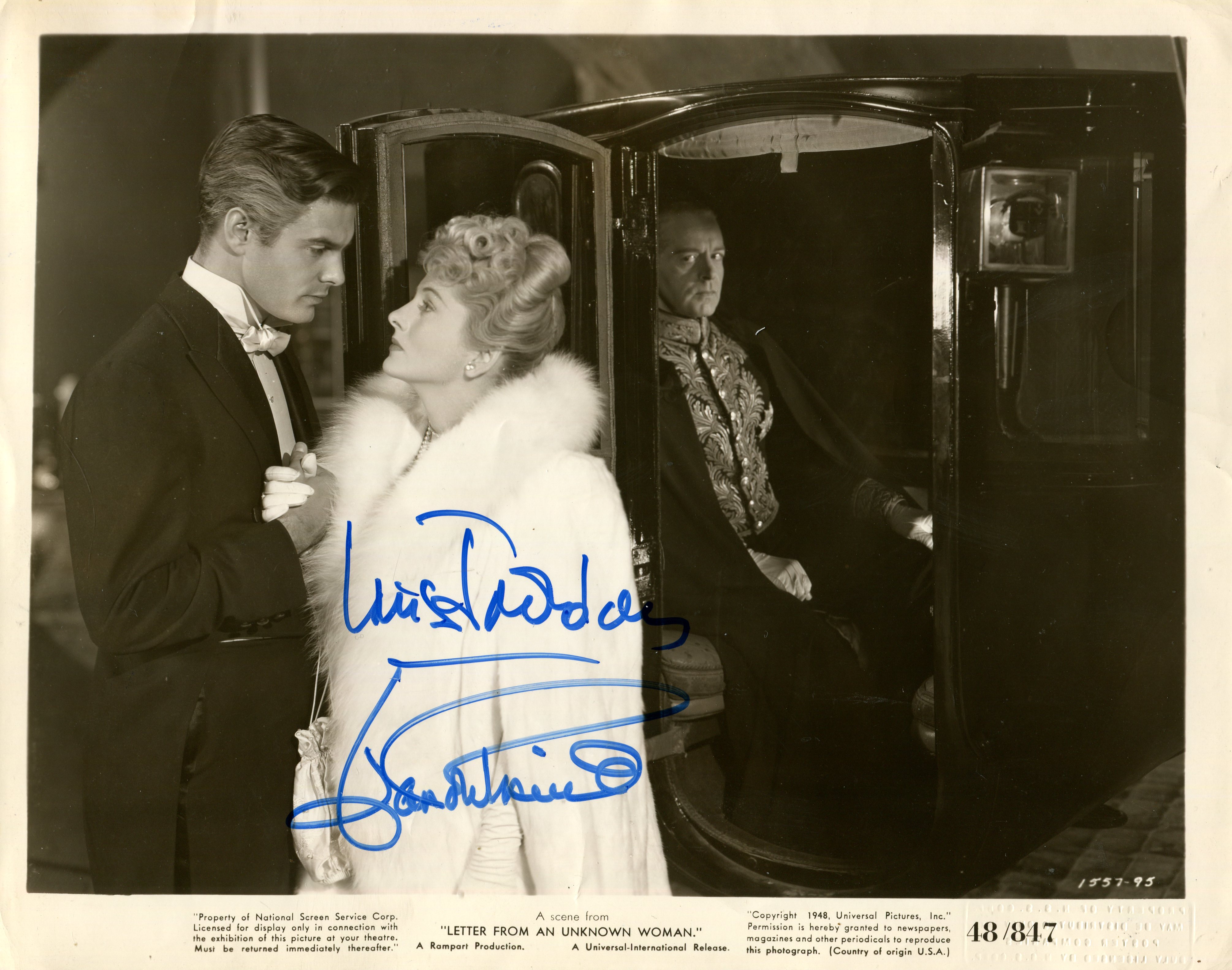 LETTER FROM AN UNKNOWN WOMAN: Signed 10 x 8 photograph by both Joan Fontaine (Lisa Berndle) and