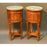 A Pair of French Oval Lamp Tables, each with a variegated marble top above a frieze drawer and