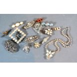A Christian Dior Mother of Pearl Set Bar Brooch together with a small collection of paste set and