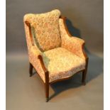 An Edwardian Mahogany Satinwood Inlaid Drawing Room Wingback Armchair with shaped scroll arms raised