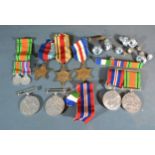 Two Second World War Defence Medals together with two war medals and three Second World War Stars,