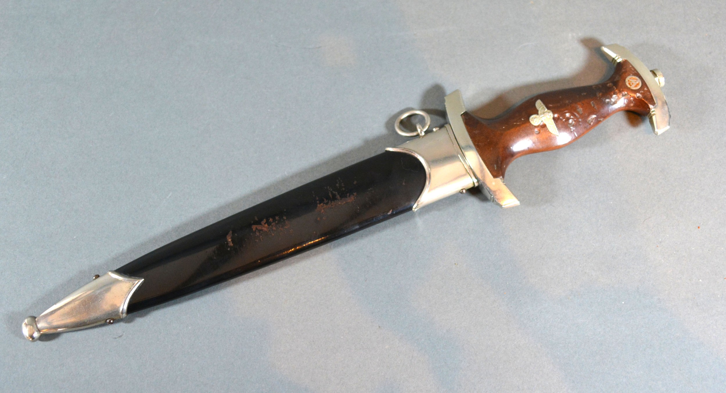A World War II German Third Reich SA Dagger, the blade inscribed F. Herder AS Solingen with metal