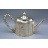 A George III Silver Teapot of shaped form, London 1797, maker's mark TA, 22 ozs.