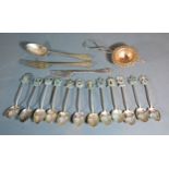 A Set of Twelve Indian White Metal Teaspoons together with a small collection of other flatware