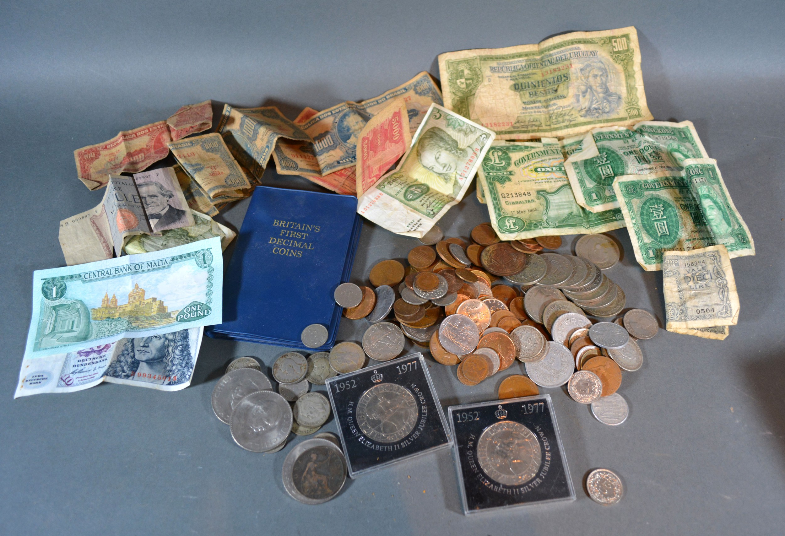 A Coin Collection, British and Foreign together with a small collection of bank notes