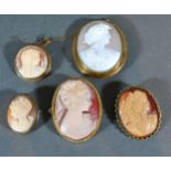 A Cameo Brooch depicting a Classical Female with an 800 silver mount together with four other