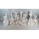 A Pair Of Cut Glass Decanters together with 10 other glass decanters
