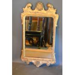 A 19th Century Giltwood Wall Mirror with eagle cresting 102 x 56 cms