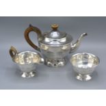 A Sheffield Silver Three Piece Tea Service comprising teapot, cream jug and sucrier, 22 ozs all in