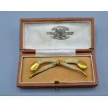 An 18ct Gold Mounted Bone Brooch retailed by P. Orr & Sons Ltd. Madras and Rangoon within fitted box