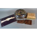 A 19th Century Lacquered Snuff Box together with three other boxes and two brushes within leather