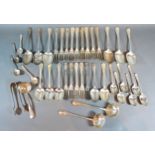 A Victorian Silver Canteen of Rat Tail Flatware comprising forks, spoons, ladles and sugar tongs,
