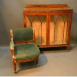 A Victorian Officer's Sword Chair together with a circa 1920's bow fronted display cabinet