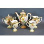An RS Poland China Tea service comprising teapot, cream jug, sucrier and two cups all decorated with