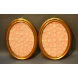 A Pair of Oval Gilded Frames containing plaster Grand Tour Medallions, 80 x 62 cms