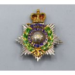 A 9ct Gold brooch, Royal Marines Gibraltar with enamel decoration, 7.6 gms, 3 x 2.5 cms