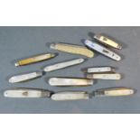 A Collection of Seven Mother of Pearl and Silver Bladed Folding Fruit Knives together with five