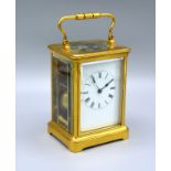 A Large French Brass Cased Carriage Clock, the enamel dial with Roman numerals and with lever