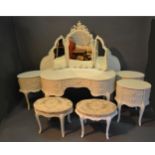 A French Style Painted Bedroom Suite comprising dressing table with triple mirror, three oval two