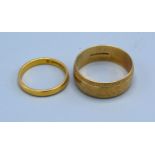 A 22ct Gold Wedding Band 3.4 gms together with a 9ct gold wedding band 6.7 gms